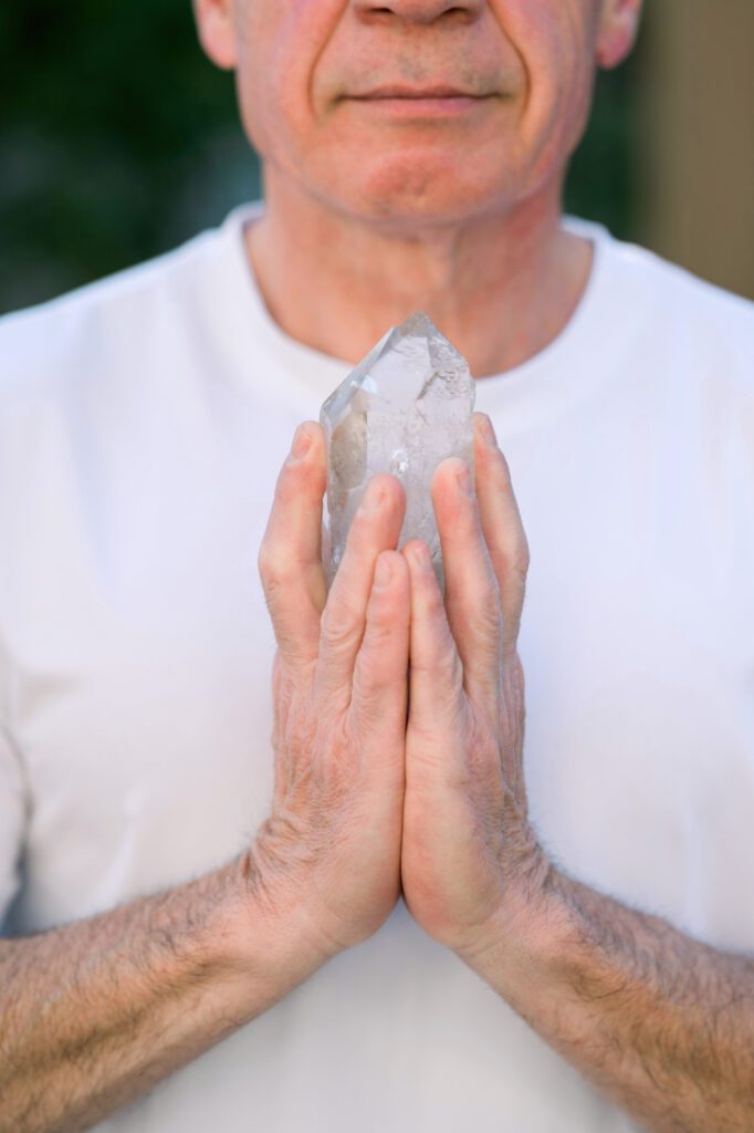 Man holding crystal