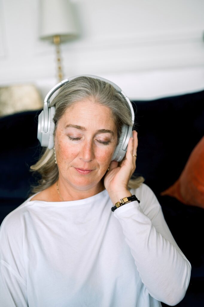 Woman listening to music in meditation