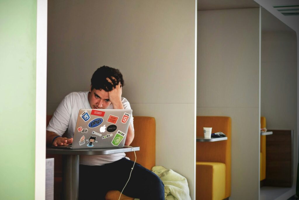 Frustrated man at computer