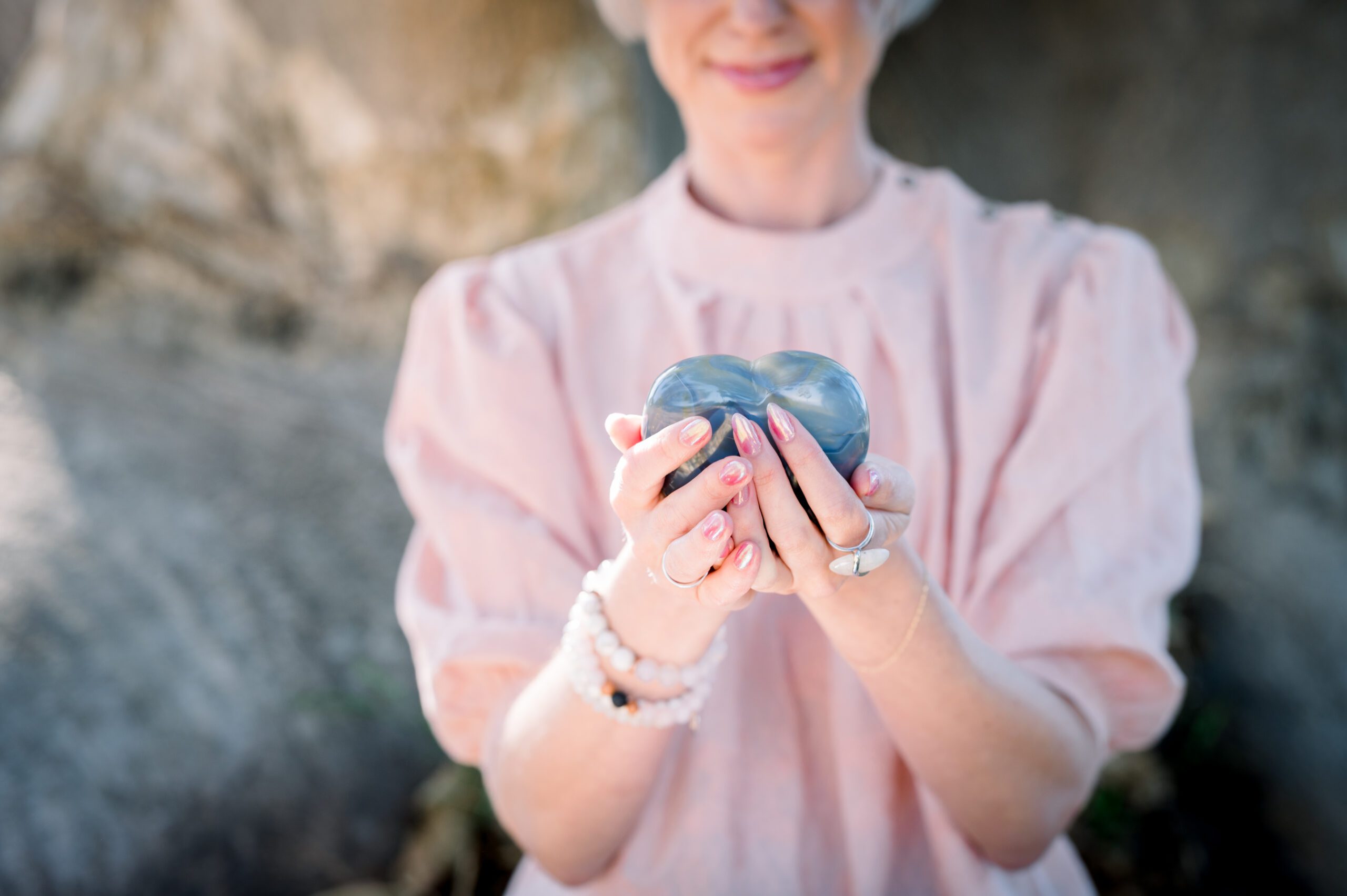 Woman holding crystal heart