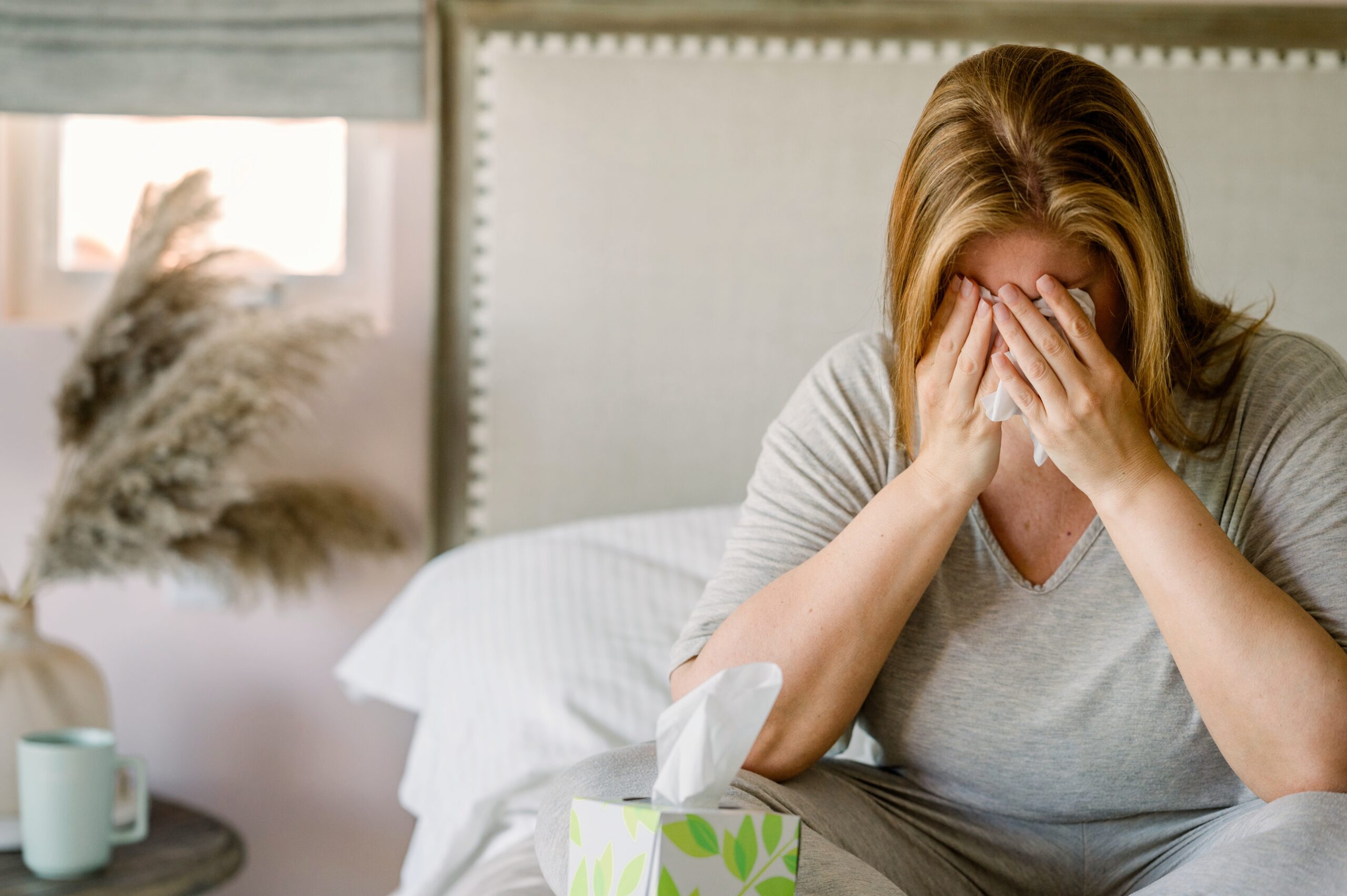 Woman crying with tissues