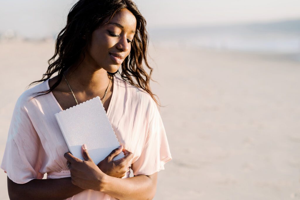 Serene woman on beach 