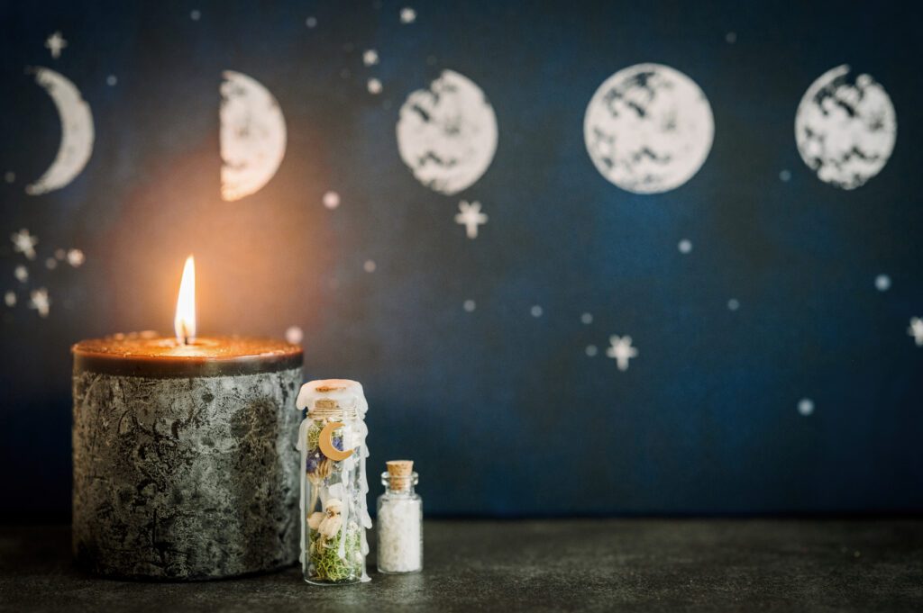 Picture of moon cycles and candle