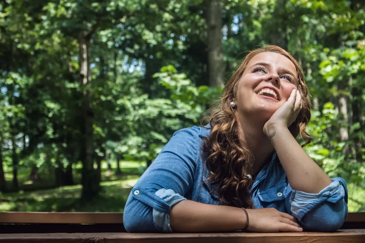 Woman Looking Up Smiling